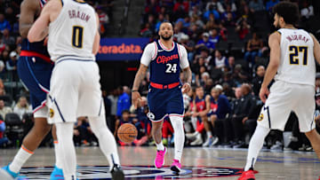 Apr 24, 2025; Inglewood, California, USA; Los Angeles Clippers guard Norman Powell (24) moves the ball against the Denver Nuggets during the second half of game three in the first round for the 2024 NBA Playoffs at Intuit Dome. Mandatory Credit: Gary A. Vasquez-Imagn Images