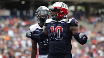 Mar 31, 2024; Houston, TX, USA; Houston Roughnecks linebacker Reuben Foster (10) celebrates after an interception in the third quarter of a game against the Memphis Showboats at Rice Stadium. Mandatory Credit: Joseph Buvid-Imagn Images