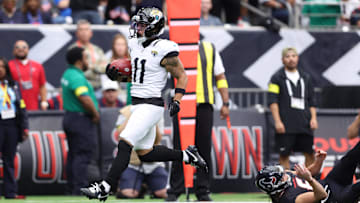 Nov 9, 2025; Houston, Texas, USA; Jacksonville Jaguars wide receiver Parker Washington (11) returns a punt for a touchdown against the Houston Texans during the first half at NRG Stadium. 