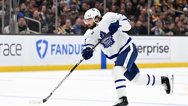 Apr 22, 2024; Boston, Massachusetts, USA; Toronto Maple Leafs defenseman Timothy Liljegren (37) takes a shot against the Boston Bruins during the second period in game two of the first round of the 2024 Stanley Cup Playoffs at TD Garden. Mandatory Credit: Brian Fluharty-Imagn Images