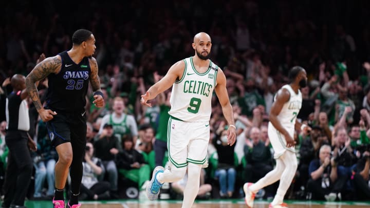 Jun 6, 2024; Boston, Massachusetts, USA; Boston Celtics guard Derrick White (9) reacts after a shot in the first quarter against the Dallas Mavericks during game one of the 2024 NBA Finals at TD Garden. Mandatory Credit: David Butler II-USA TODAY Sports