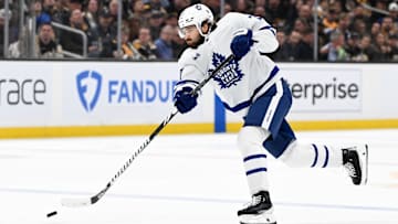Apr 22, 2024; Boston, Massachusetts, USA; Toronto Maple Leafs defenseman Timothy Liljegren (37) takes a shot against the Boston Bruins during the second period in game two of the first round of the 2024 Stanley Cup Playoffs at TD Garden. Mandatory Credit: Brian Fluharty-Imagn Images