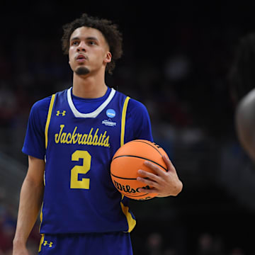 South Dakota State's guard Zeke Mayo (2) takes a deep breath before shooting the free throw during the second half on Thursday, March 21, 2024 at the CHI Health Center in Omaha, Nebraska.