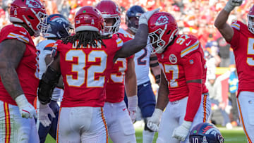 Nov 10, 2024; Kansas City, Missouri, USA; Kansas City Chiefs defensive end Felix Anudike-Uzomah (97) celebrates with linebacker Nick Bolton (32) after a sack against the Denver Broncos during the second half at GEHA Field at Arrowhead Stadium. Mandatory Credit: Denny Medley-Imagn Images