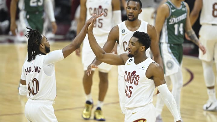 Mar 4, 2023; Cleveland, Ohio, USA; Cleveland Cavaliers guard Darius Garland (10) and guard Donovan Mitchell (45) celebrate in the second quarter against the Detroit Pistons at Rocket Mortgage FieldHouse. Mandatory Credit: David Richard-USA TODAY Sports