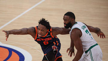 May 12, 2025; New York, New York, USA; New York Knicks forward OG Anunoby (8) is fouled by Boston Celtics guard Jaylen Brown (7) in the second half during game four of the second round for the 2025 NBA Playoffs at Madison Square Garden. Mandatory Credit: Vincent Carchietta-Imagn Images