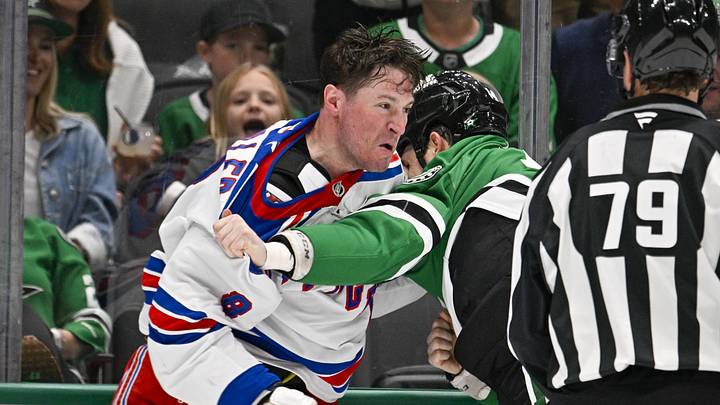 Apr 11, 2026; Dallas, Texas, USA; New York Rangers left wing J.T. Miller (8) fights with Dallas Stars left wing Jamie Benn (14) during the second period at the American Airlines Center. Mandatory Credit: Jerome Miron-Imagn Images