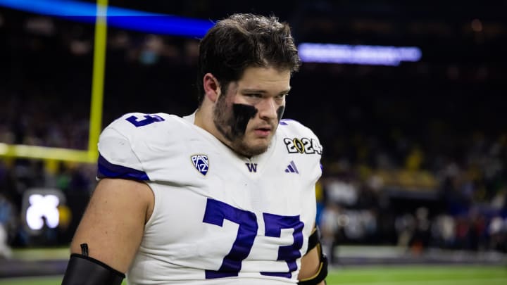 Jan 8, 2024; Houston, TX, USA; Washington Huskies offensive lineman Roger Rosengarten (73) against the Michigan Wolverines during the 2024 College Football Playoff national championship game at NRG Stadium. Mandatory Credit: Mark J. Rebilas-USA TODAY Sports