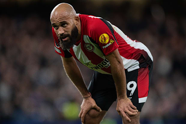 Bryan Mbeumo crouching.