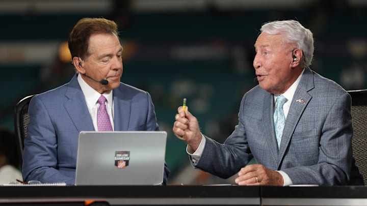 Jan 9, 2025; Miami, FL, USA; ESPN analysts Nick Saban and Lee Corso before the game between the Notre Dame Fighting Irish and the Penn State Nittany Lions at Hard Rock Stadium. Mandatory Credit: Nathan Ray Seebeck-Imagn Images