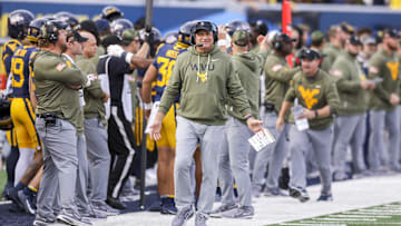 Nov 8, 2025; Morgantown, West Virginia, USA; West Virginia Mountaineers head coach Rich Rodriguez reacts after a play during the third quarter against the Colorado Buffaloes at Milan Puskar Stadium. Mandatory Credit: Ben Queen-Imagn Images