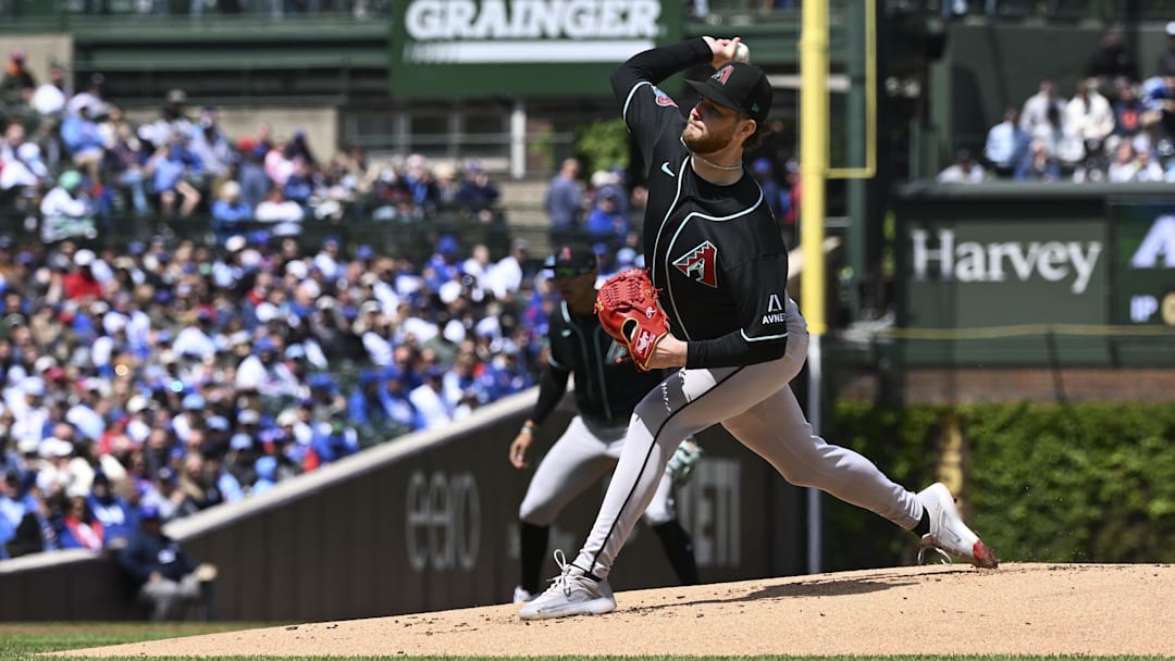 May 2, 2026; Chicago, Illinois, USA;  Arizona Diamondbacks pitcher Ryne Nelson (19) delivers a pitch during the first inning against the Chicago Cubs at Wrigley Field. Mandatory Credit: Matt Marton-Imagn Images