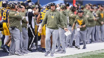 Nov 8, 2025; Morgantown, West Virginia, USA; West Virginia Mountaineers head coach Rich Rodriguez reacts after a play during the third quarter against the Colorado Buffaloes at Milan Puskar Stadium. Mandatory Credit: Ben Queen-Imagn Images