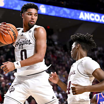 Dec 20, 2024; College Station, Texas, USA; Texas A&M Aggies guard Jace Carter (0) secures the rebound /during the second half against the Houston Christian Huskies at Reed Arena. The Aggies defeated the Huskies 77-45. Mandatory Credit: Maria Lysaker-Imagn Images 