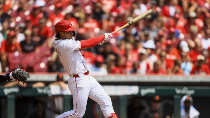 Aug 4, 2024; Cincinnati, Ohio, USA; Cincinnati Reds outfielder Santiago Espinal (4) hits a solo home run in the second inning against the San Francisco Giants at Great American Ball Park. Mandatory Credit: Katie Stratman-USA TODAY Sports