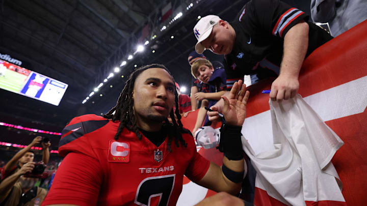 CJ Stroud and the Houston Texans walk off the field as winners against the Las Vegas Raiders