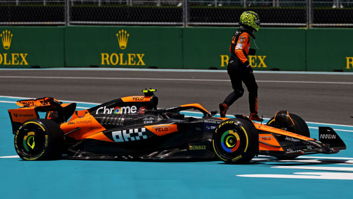 May 4, 2024; Miami Gardens, Florida, USA; McLaren driver Lando Norris (4) gets out of his car after spinning out on the first turn at the start of the F1 Sprint Race at Miami International Autodrome. Mandatory Credit: Peter Casey-USA TODAY Sports