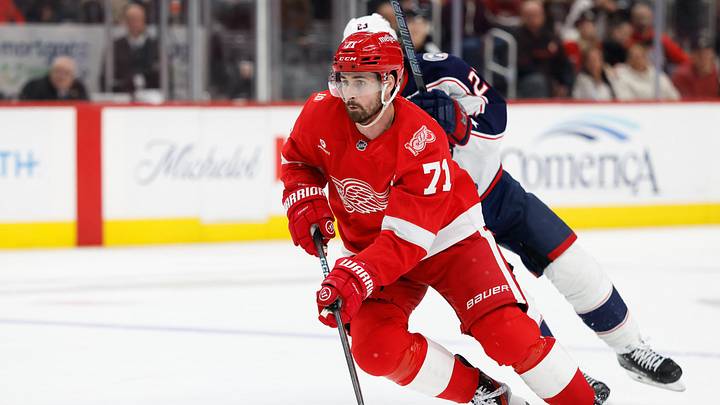 Apr 7, 2026; Detroit, Michigan, USA; Detroit Red Wings center Dylan Larkin (71) skates with the puck in overtime against the Columbus Blue Jackets at Little Caesars Arena. Apr 7, 2026; Detroit, Michigan, USA; Detroit Red Wings center Dylan Larkin (71) skates with the puck in overtime against the Columbus Blue Jackets at Little Caesars Arena.