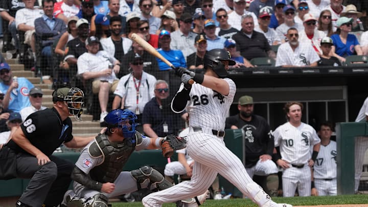 May 17, 2026; Chicago, Illinois, USA; Chicago White Sox catcher Edgar Quero (26) hits a one run single against the Chicago Cubs during the second inning at Rate Field. Mandatory Credit: David Banks-Imagn Images