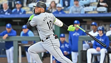 Apr 4, 2024; Kansas City, Missouri, USA;  Chicago White Sox third baseman Yoan Moncada (10) singles in the first inning against the Kansas City Royals at Kauffman Stadium. Mandatory Credit: Peter Aiken-Imagn Images
