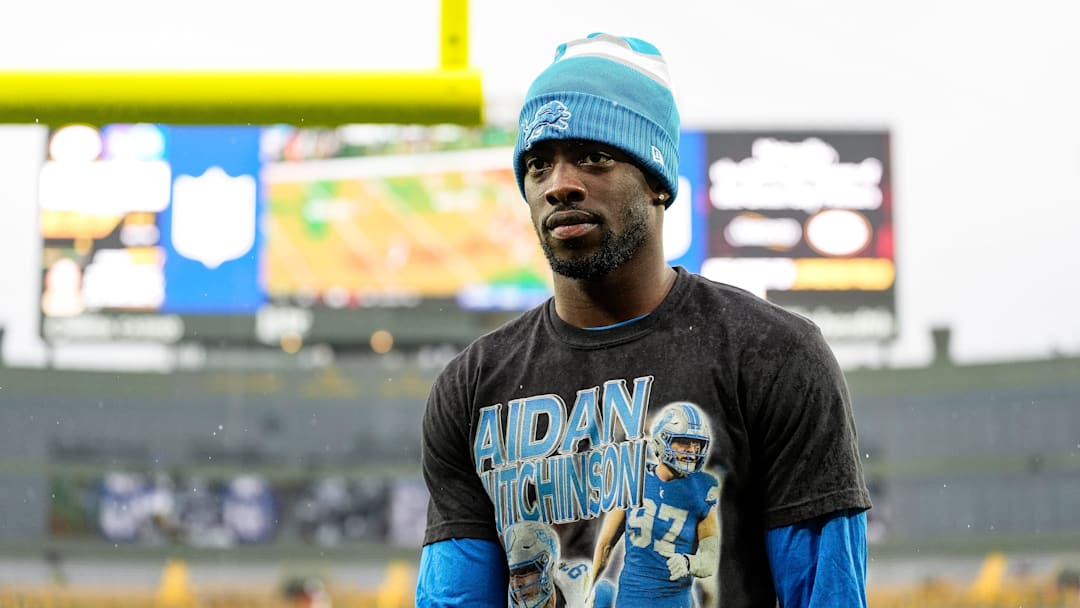 Detroit Lions cornerback Terrion Arnold walks off the field during warmups before the Green Bay Packers game at Lambeau Field in Green Bay, Wis. on Sunday, Nov. 3, 2024. He was wearing a T-shirt in support of injured teammate Aidan Hutchinson.