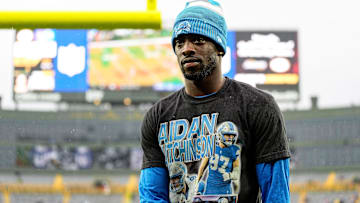 Detroit Lions cornerback Terrion Arnold walks off the field during warmups before the Green Bay Packers game at Lambeau Field in Green Bay, Wis., on Sunday, Nov. 3, 2024. He was wearing a T-shirt in support of injured teammate Aidan Hutchinson.