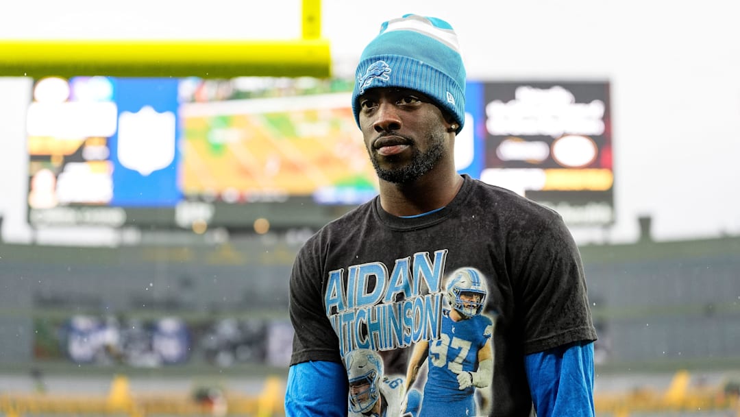 Detroit Lions cornerback Terrion Arnold walks off the field during warmups before the Green Bay Packers game at Lambeau Field in Green Bay, Wis. on Sunday, Nov. 3, 2024. He was wearing a T-shirt in support of injured teammate Aidan Hutchinson.