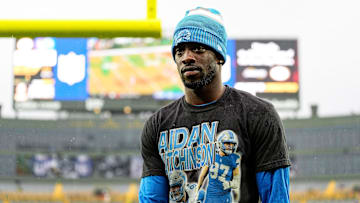 Detroit Lions cornerback Terrion Arnold walks off the field during warmups before the Green Bay Packers game at Lambeau Field in Green Bay, Wis. on Sunday, Nov. 3, 2024. He was wearing a T-shirt in support of injured teammate Aidan Hutchinson.