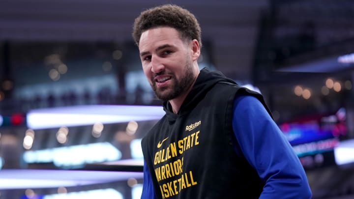 Golden State Warriors guard Klay Thompson (11) warms up before a play-in game against the Sacramento Kings