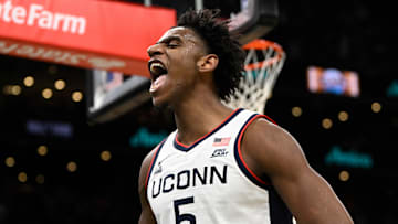 Nov 15, 2025; Boston, Massachusetts, USA; UConn Huskies forward Tarris Reed Jr. (5) reacts to a foul during the first half by the BYU Cougars at TD Garden. Mandatory Credit: Eric Canha-Imagn Images
