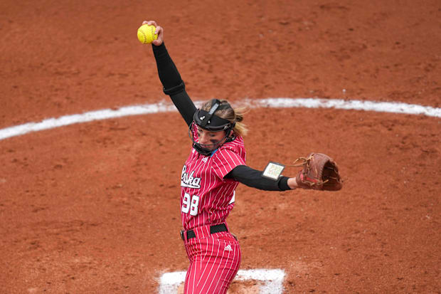 Nebraska's Jordyn Bahl (98) pitches during a NCAA super regionals softball game.