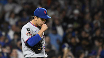 Sep 24, 2025; Chicago, Illinois, USA;  New York Mets pitcher Jonah Tong (21) reacts during the third inning against the Chicago Cubs at Wrigley Field. Mandatory Credit: Matt Marton-Imagn Images