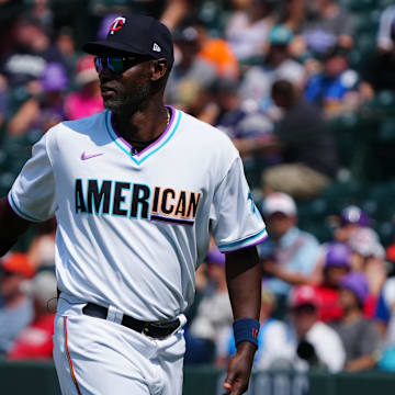 Jul 11, 2021; Denver, CO, USA; American League manager Latroy Hawkins leaves the mound in the fifth inning against the National League of the 2021 MLB All Star Futures Game at Coors Field. Mandatory Credit: Ron Chenoy-Imagn Images