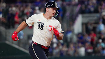 Texas Rangers left fielder Wyatt Langford (36) runs the bases after hitting a solo home run during the sixth inning against the Cleveland Guardians at Globe Life Field. 