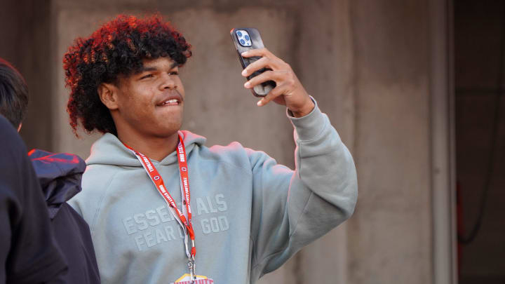 Recruit Jonah Williams watches Ohio State warm up before playing Penn State Oct. 21, 2023 at Ohio Stadium.