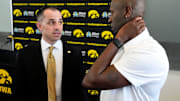 Iowa head men's basketball coach Ben McCollum speaks to Kenyon Murray after his introductory press conference Tuesday, March 25, 2025 at Carver-Hawkeye Arena in Iowa City, Iowa.
