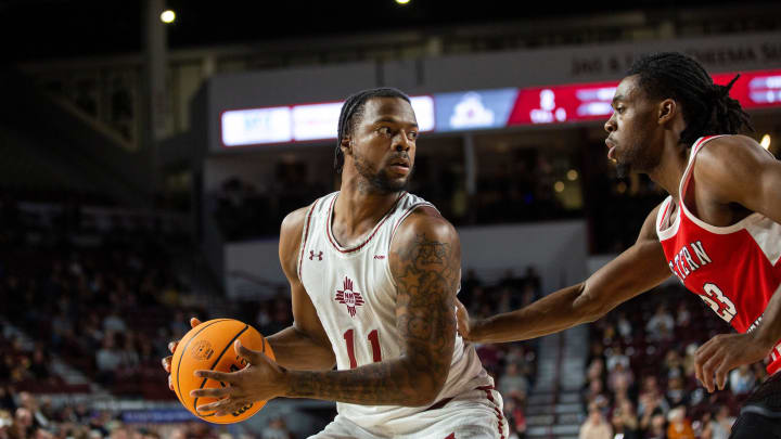 NMSU guard Femi Odukale looks for a teammate to pass the ball to during a college basketball game on Thursday, Jan. 18, 2024, at Pan American Center.