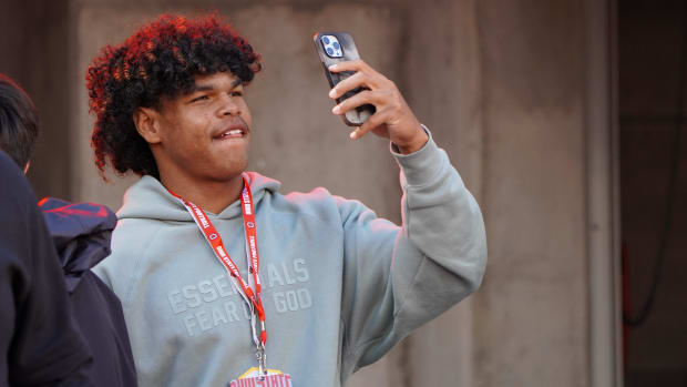 Recruit Jonah Williams watches Ohio State warm up before playing Penn State Oct. 21, 2023 at Ohio Stadium