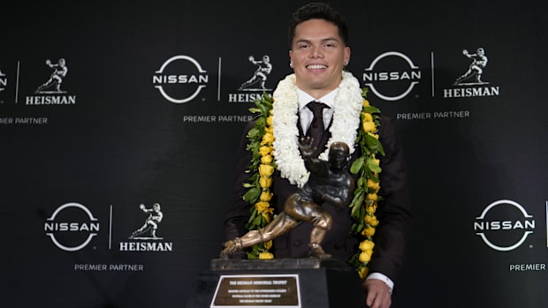 Oregon Ducks quarterback Dillon Gabriel poses for a photo during a press conference before the 2024 Heisman Trophy Presentati