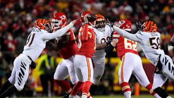 Jan 29, 2023; Kansas City, Missouri, USA;Cincinnati Bengals defensive end Trey Hendrickson (91), defensive tackle BJ Hill (92) and defensive end Joseph Ossai (58) pressure Kansas City Chiefs quarterback Patrick Mahomes (15) in the fourth quarter during the AFC championship NFL game between the Cincinnati Bengals and the Kansas City Chiefs, Sunday, Jan. 29, 2023, at GEHA Field at Arrowhead Stadium in Kansas City, Mo. The Kansas City Chiefs lead the Cincinnati Bengals, 13-6, at halftime. 