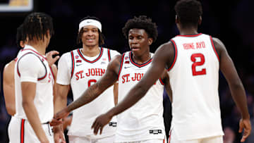 Butler v St. John's; St. John's basketball players greet Kadary Richmond during the Big East Tournament Quarterfinal