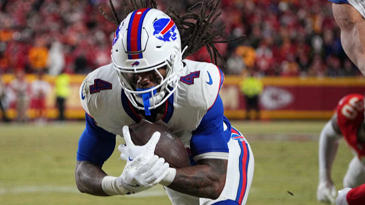 Jan 26, 2025; Kansas City, MO, USA; Buffalo Bills running back James Cook (4) dives for a touchdown against the Kansas City Chiefs in the AFC Championship Game