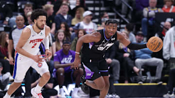 Mar 3, 2025; Salt Lake City, Utah, USA; Utah Jazz guard Isaiah Collier (13) brings the ball up the court with Detroit Pistons guard Cade Cunningham (2) during the second half at Delta Center. Mandatory Credit: Rob Gray-Imagn Images