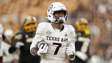 Nov 8, 2025; Columbia, Missouri, USA; Texas A&M Aggies wide receiver KC Concepcion (7) runs for a touchdown during the second half against the Missouri Tigers at Faurot Field at Memorial Stadium. Mandatory Credit: Jay Biggerstaff-Imagn Images]