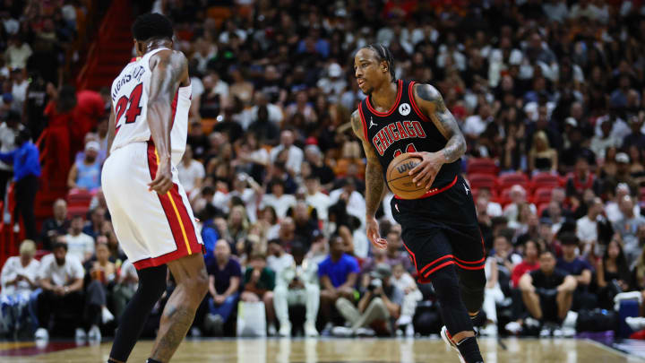 Apr 19, 2024; Miami, Florida, USA; Chicago Bulls forward DeMar DeRozan (11) dribbles the basketball against the Miami Heat in the second quarter during a play-in game of the 2024 NBA playoffs at Kaseya Center. Mandatory Credit: Sam Navarro-USA TODAY Sports