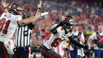Aug 23, 2025; Tampa, Florida, USA;Tampa Bay Buccaneers wide receiver Tez Johnson (83) celebrates after scoring a touchdown against the Buffalo Bills during the second quarter at Raymond James Stadium. Mandatory Credit: Kim Klement Neitzel-Imagn Images