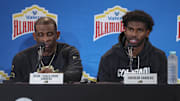Dec 28, 2024; San Antonio, TX, USA; Colorado Buffaloes head coach Deion Sanders and quarterback Shedeur Sanders (2) talk with the media after the game against the Brigham Young Cougars at Alamodome. Mandatory Credit: Troy Taormina-Imagn Images