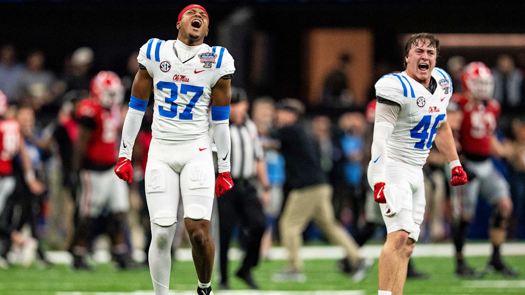 Ole Miss safety Cortez Thomas (37) and linebacker Cooper Cannon (46) celebrate on the field after the Sugar Bowl and College Football Playoff quarterfinals at Caesars Superdome in New Orleans, La., on Thursday, Jan. 1, 2026. Ole Miss defeated Georgia 39-34.