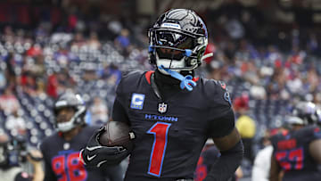 Oct 6, 2024; Houston, Texas, USA; Houston Texans wide receiver Stefon Diggs (1) warms up before the game against the Buffalo Bills at NRG Stadium. Mandatory Credit: Troy Taormina-Imagn Images