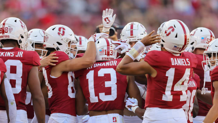 Sep 16, 2023; Stanford, California, USA; Stanford Cardinal wide receiver Elic Ayomanor (13) is congratulated by teammates after catching  a touchdown pass during the second quarter against the Sacramento State Hornets at Stanford Stadium. Mandatory Credit: Sergio Estrada-USA TODAY Sports